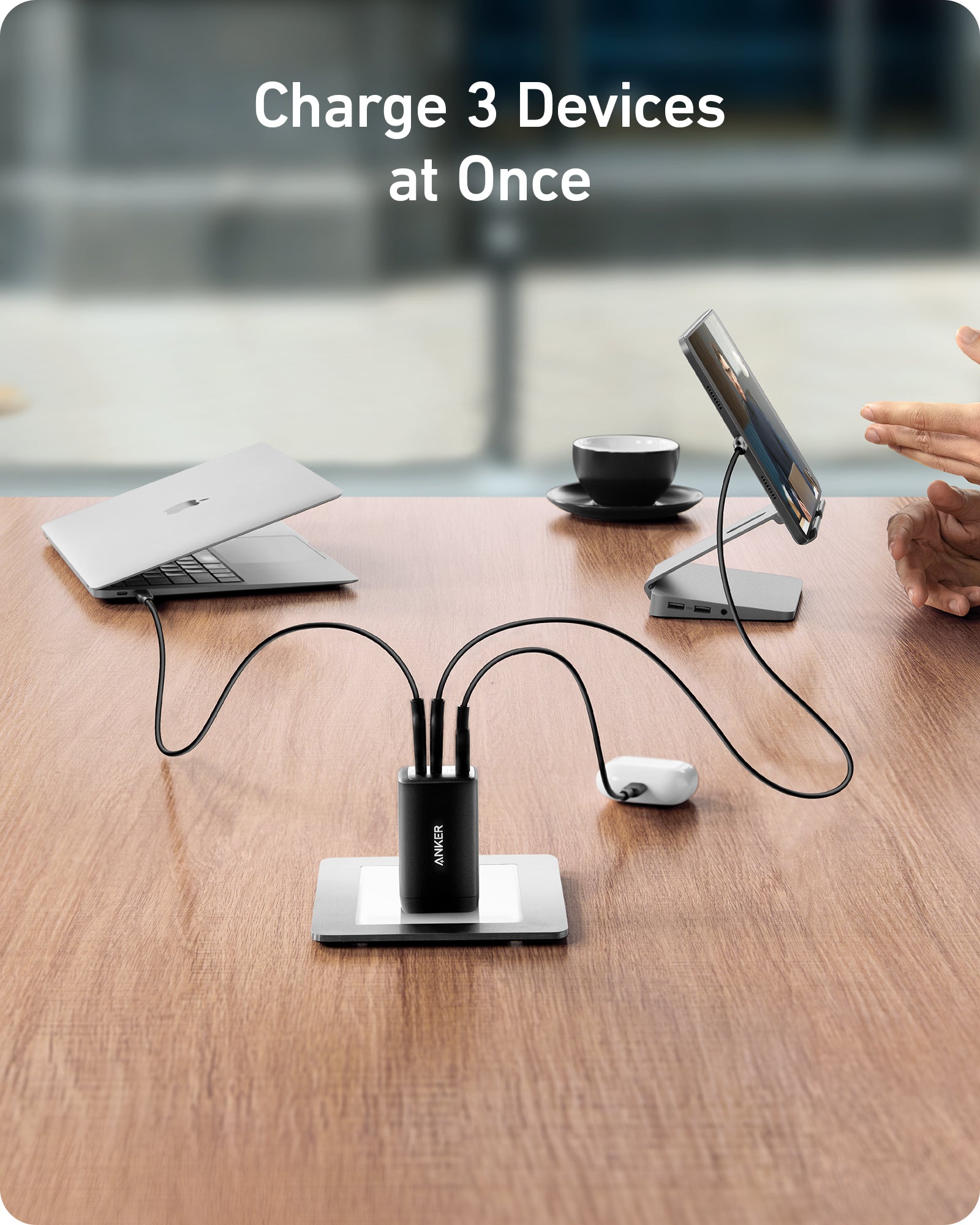 Anker charger with three cables for charging multiple devices.